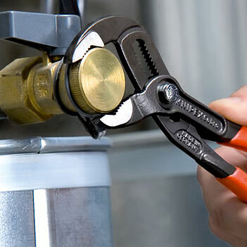 Кліщі переставні KNIPEX Cobra Cr-V 250 мм з кнопковим фіксатором (87 05 250)