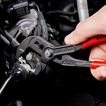 Клещи для снятия хомутов KNIPEX Cr-V 180 мм с кнопочным фиксатором (85 51 180 A)