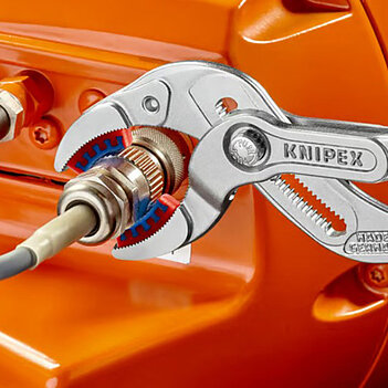 Кліщі переставні KNIPEX Cr-V 250 мм з кнопковим фіксатором (81 13 250)